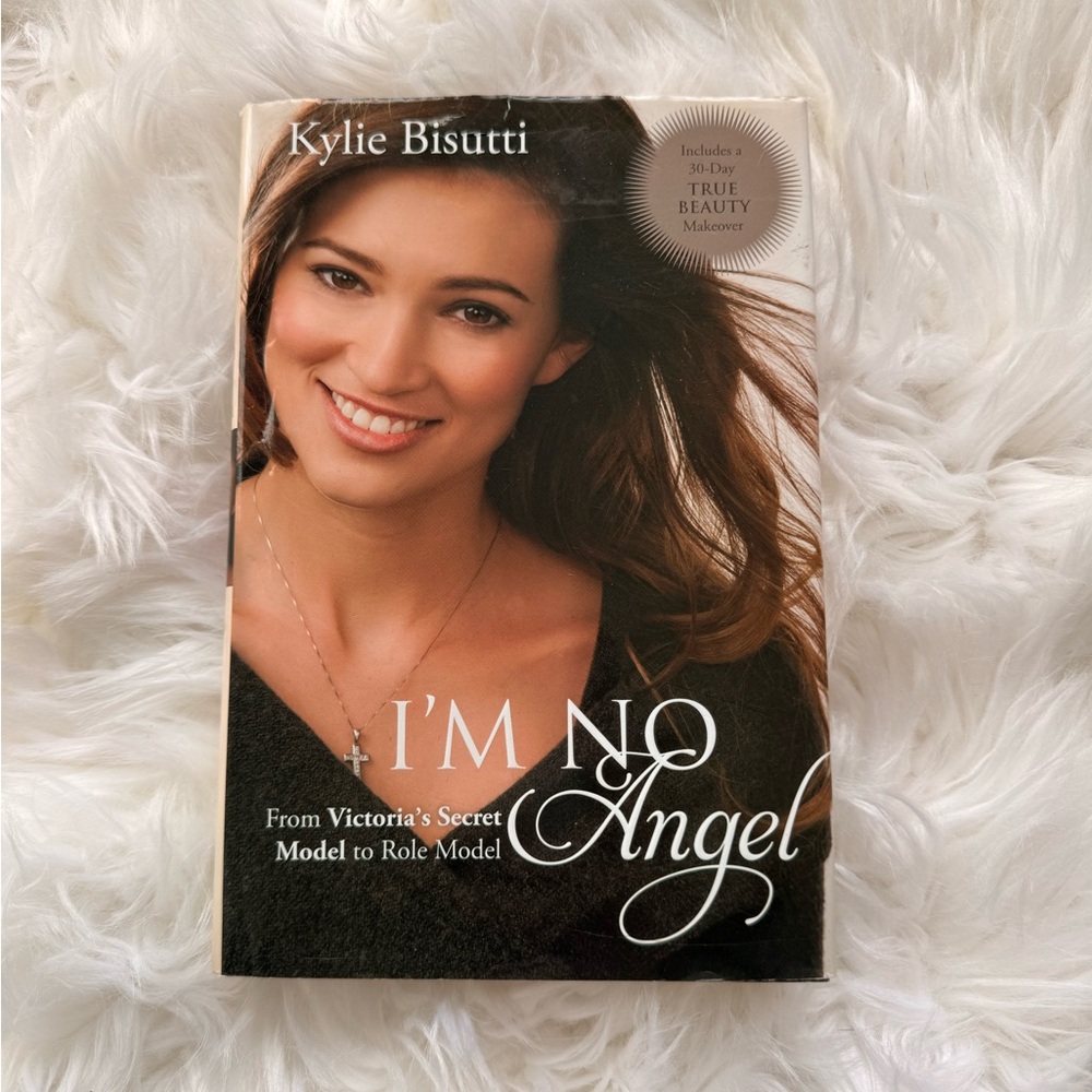 I'm No Angel by Kylie Bisutti - Black & Brown Hard Cover